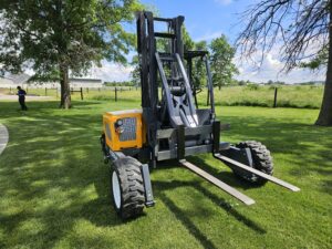 The Loadmac 255 piggyback forklift is a light and agile machine the still has the ability to handle tough building material delivery and farm products jobs.