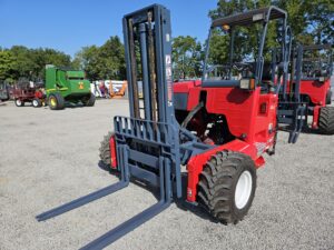 Moffett M8 55.3P truck mounted forklift with extended forks, designed for efficient one-side offloading and agility in construction and logistics operations.