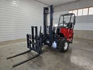 This is a Moffett forklifts M8 55.4P NX with a Moffett extra reach pantograph.