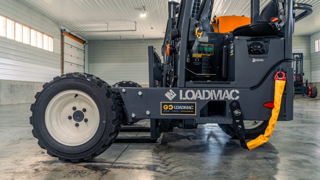 Interior detail shot of the GoLoadMac 255 Ultra 2-Way truck mounted forklift, showing operator controls and equipment components. Located at 18915 Bull Rapids Rd, Spencerville, IN 46788.