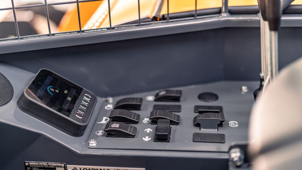 GoLoadMac 855 Super Reach 2-Way truck mounted forklift detail shot highlighting cab, controls, and safety features.