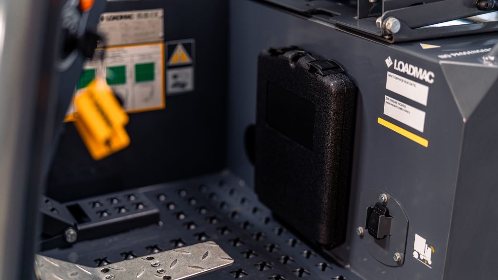 GoLoadMac 855 4-Way truck mounted forklift detail shot highlighting cab, controls, and safety features.