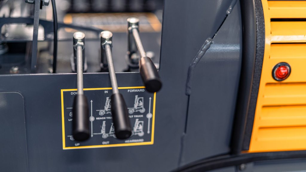 GoLoadMac 855 4-Way truck mounted forklift detail shot highlighting cab, controls, and safety features.