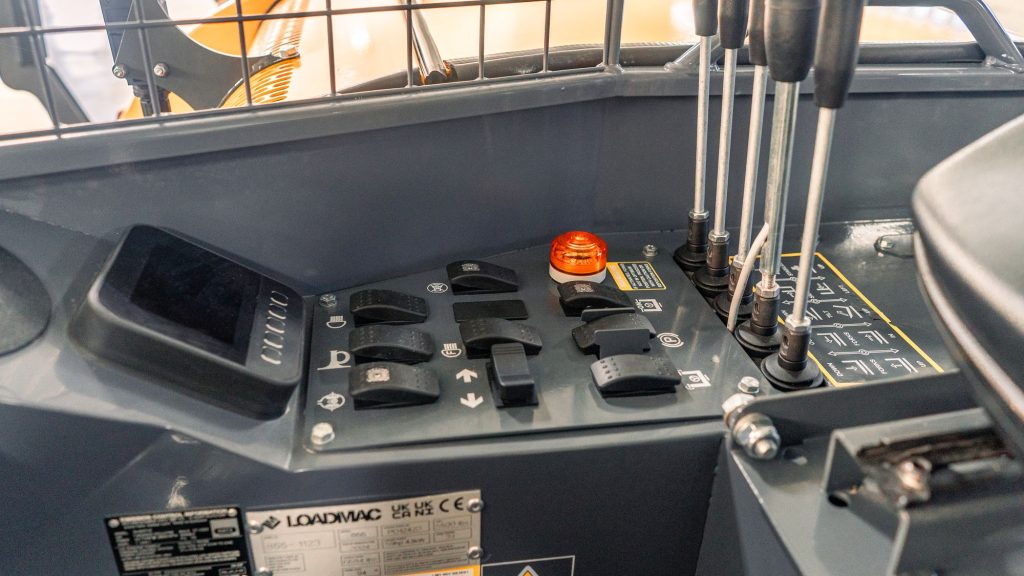 GoLoadMac 855 4-Way truck mounted forklift detail shot highlighting cab, controls, and safety features.