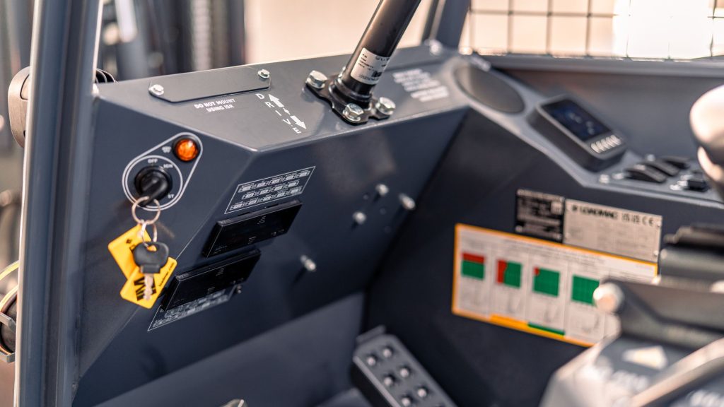 GoLoadMac 855 4-Way truck mounted forklift detail shot highlighting cab, controls, and safety features.