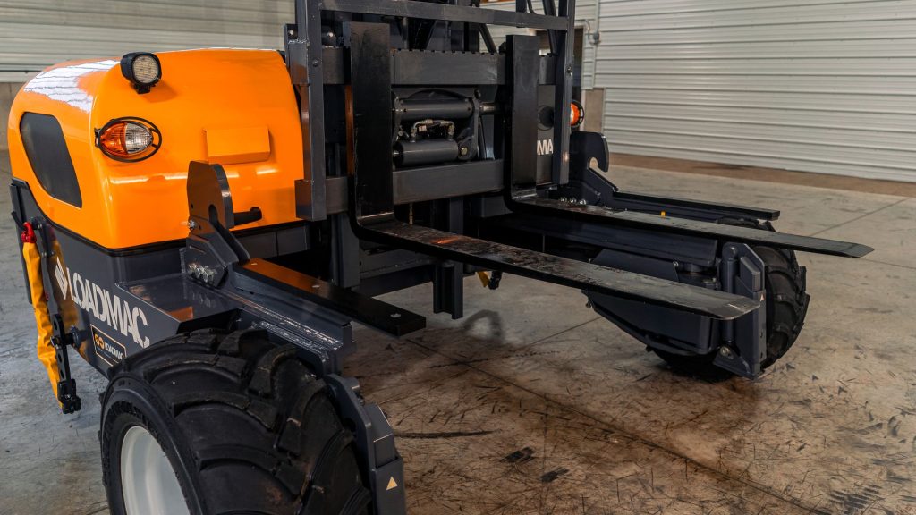 GoLoadMac 855 4-Way truck mounted forklift detail shot highlighting cab, controls, and safety features.